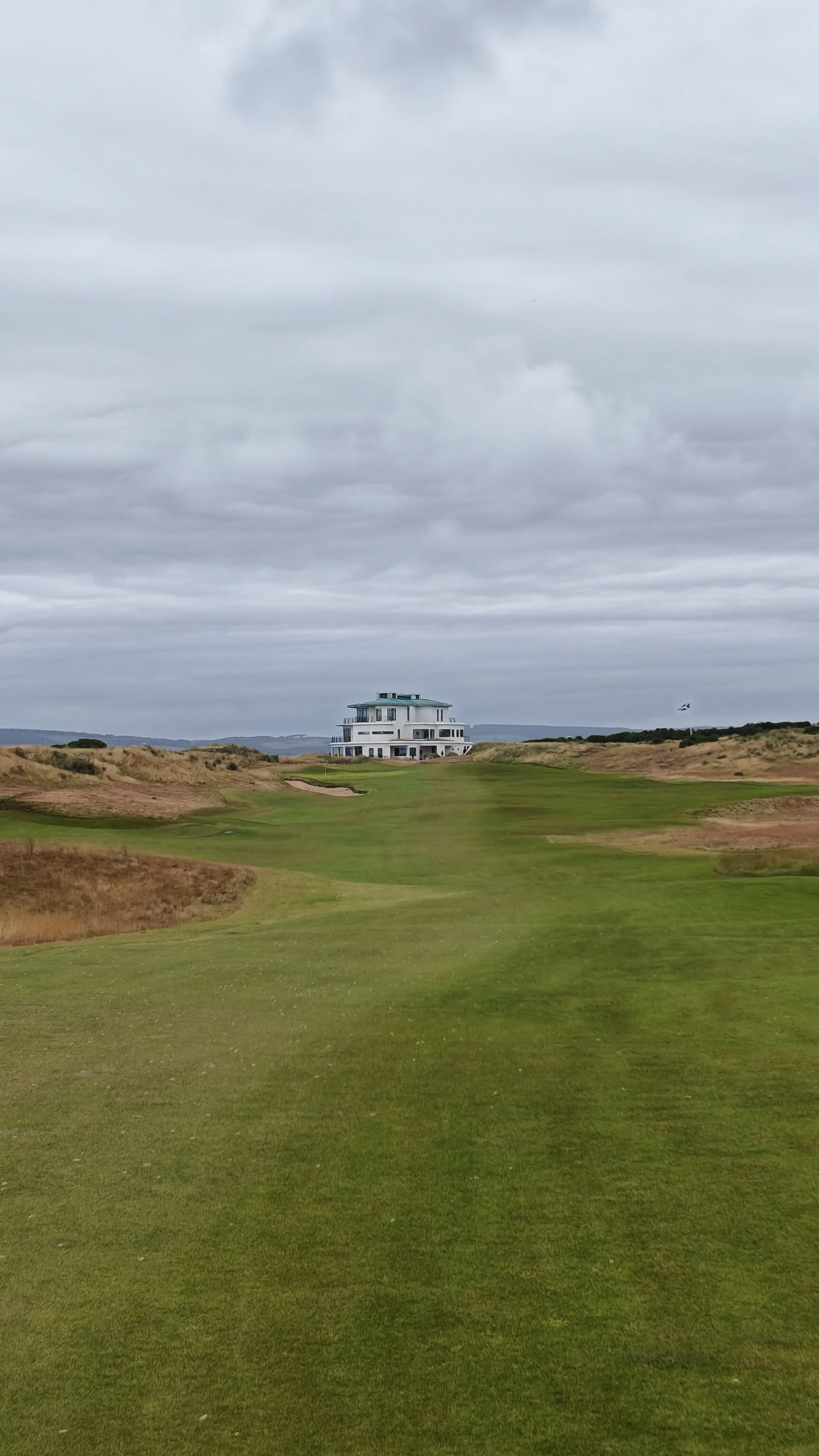 The clubhouse beyond the green